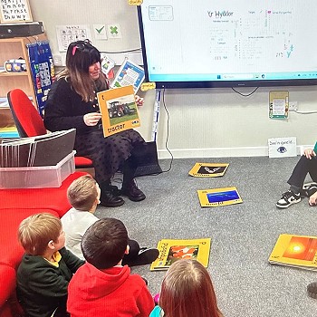 teacher reading a welsh story to the class