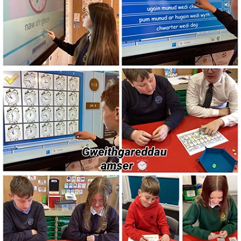 students using the white board